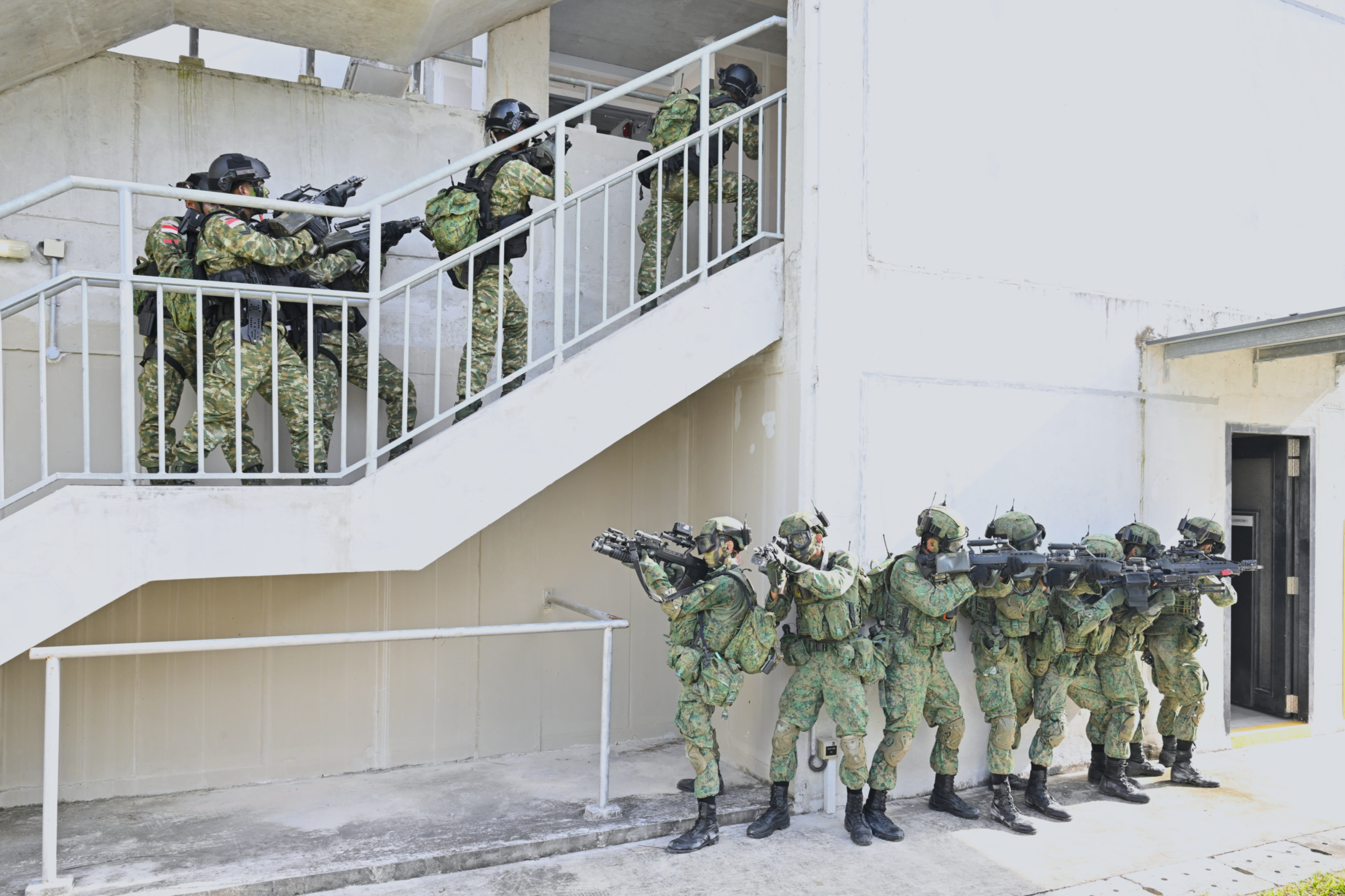Soldiers from the Singapore Army and the TNI-AD participating in a Combined FTX in SAFTI City, marking the first time...